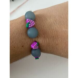 Handmade light blue and grape bead bracelet